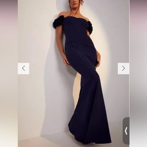 Women’s maxi navy gown with floral sleeve design and corset size 4 worn once